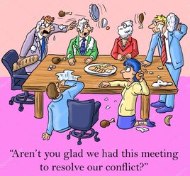 Manager discussing shift changes with staff in a meeting room
