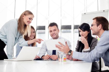 Team discussing shift plan around a table